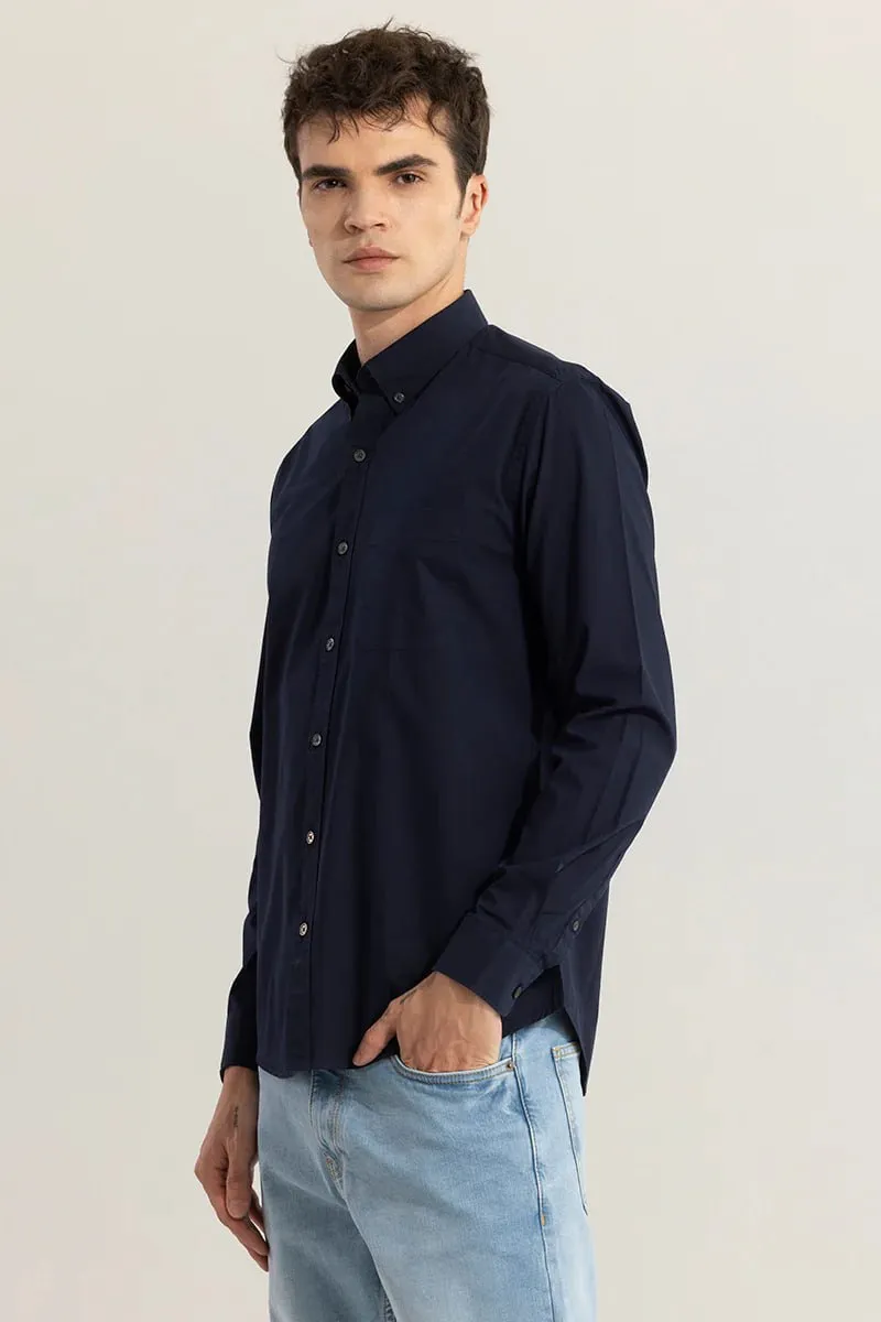 THIS SOLID BLUE SHIRT