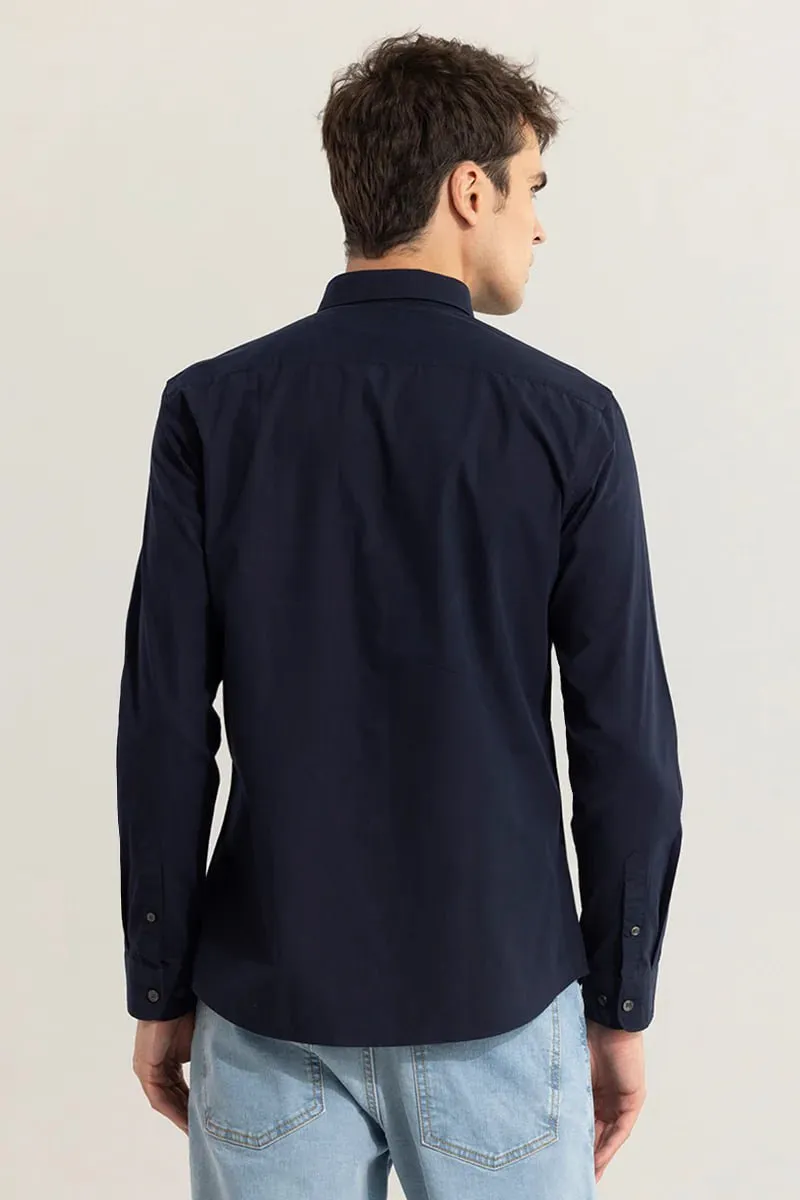 THIS SOLID BLUE SHIRT