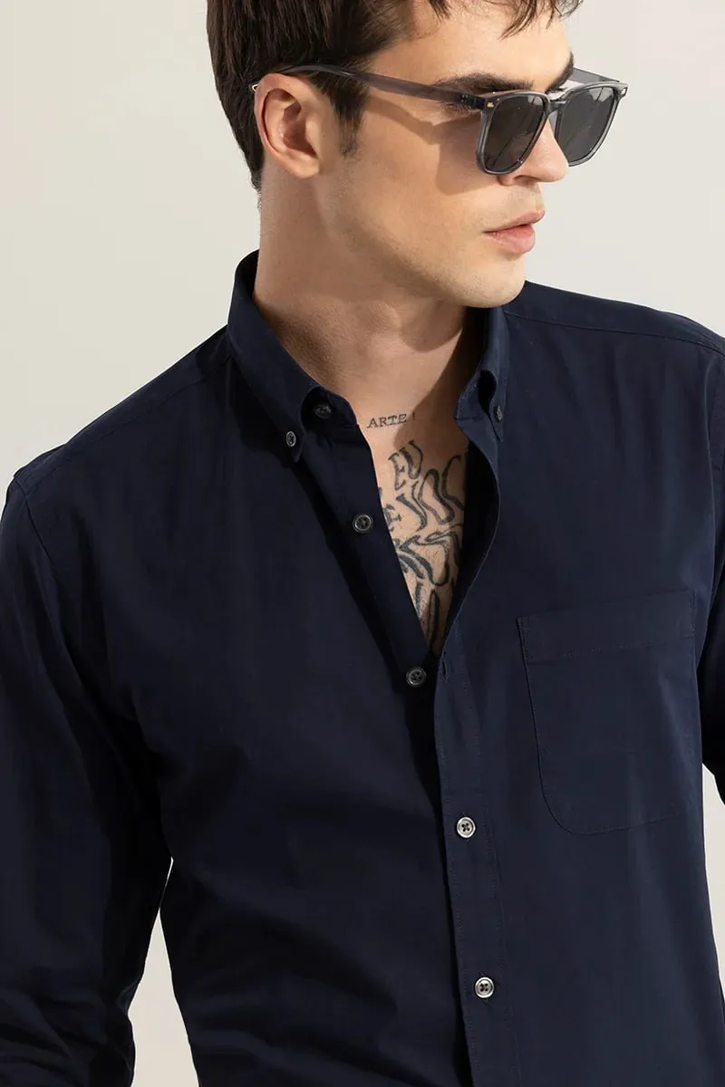 THIS SOLID BLUE SHIRT